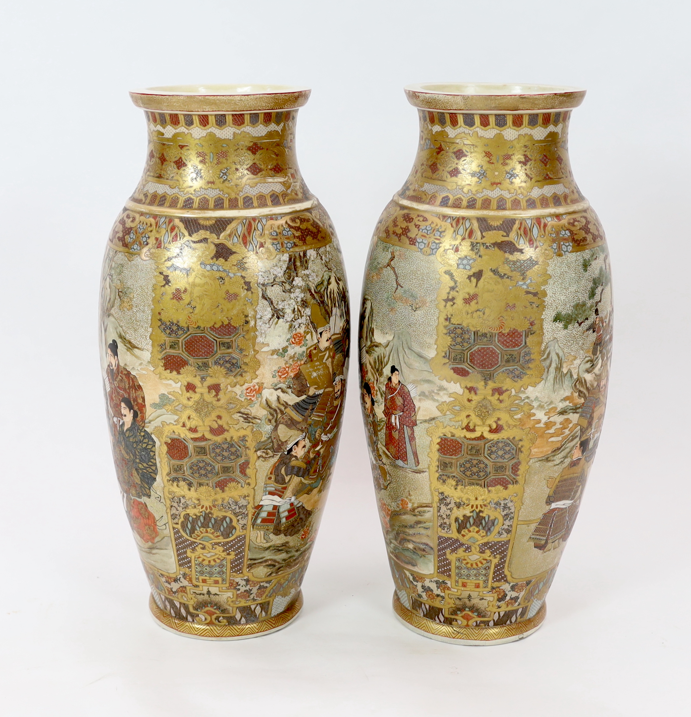 A pair of large Japanese Satsuma pottery 'Samurai' vases, Meiji period, one vase restored